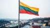 LITHUANIA – Lithuanian flag over the city of Kaunas, which is located 104 kilometers from the capital of Lithuania